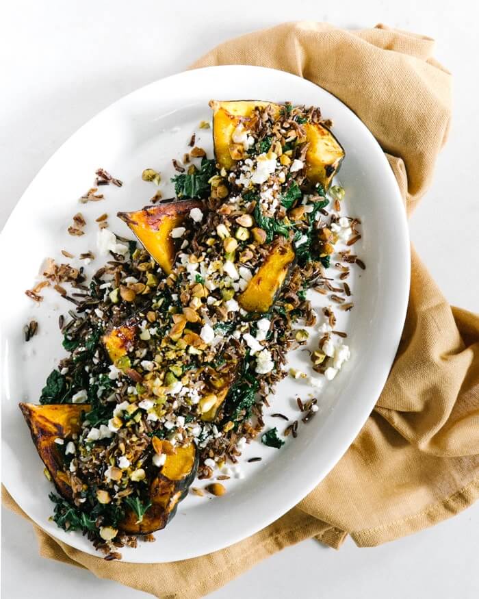 Roasted Acorn Squash with Wild Rice Pistachio Stuffing | Fancy Foods Show