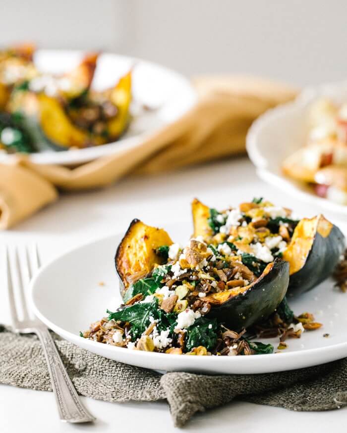 Roasted Acorn Squash with Wild Rice Pistachio Stuffing | Fancy Foods Show