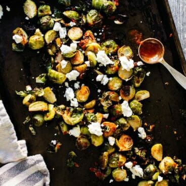 Roasted Brussels Sprouts with Goat Cheese & Harissa | Fancy Foods Show