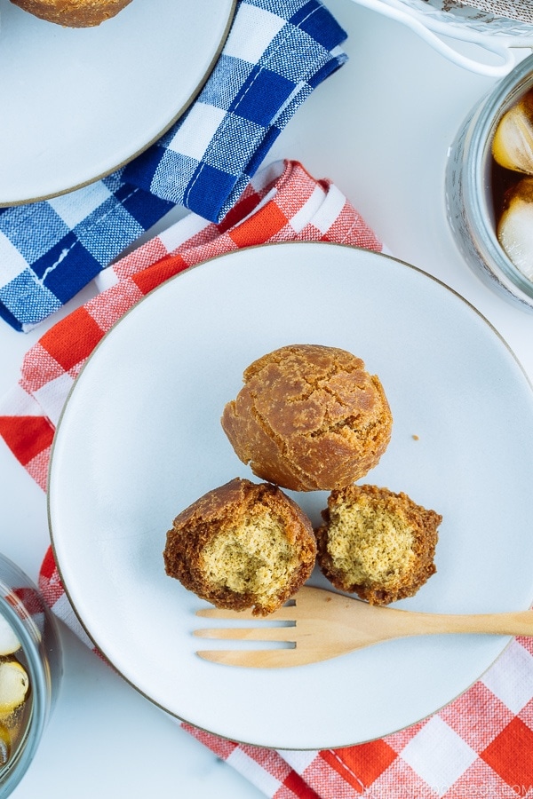 Sata Andagi (Okinawan Doughnuts) on a white plate.