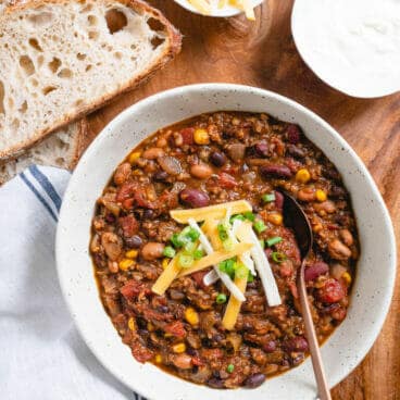 Easy Vegetarian Chili - you won't miss the meat with this crowd pleasing recipe!