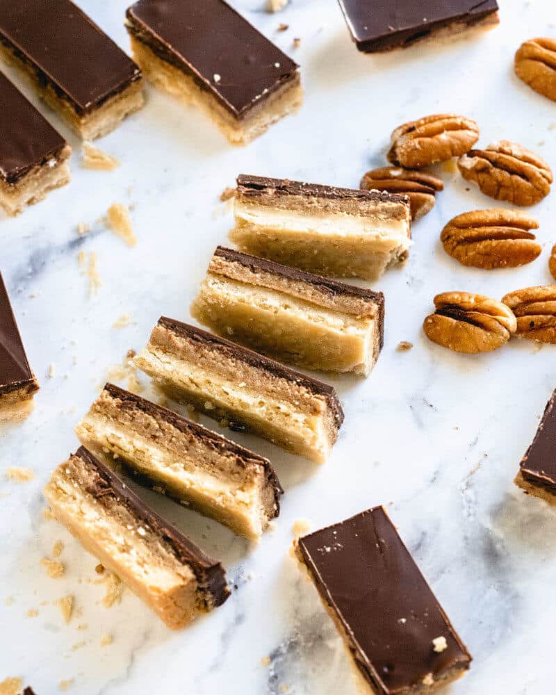 Pecan butter millionaire bars | caramelized pecans | maple pecan shortbread millionaire bars | maple pecan bars | easy vegan dessert recipes