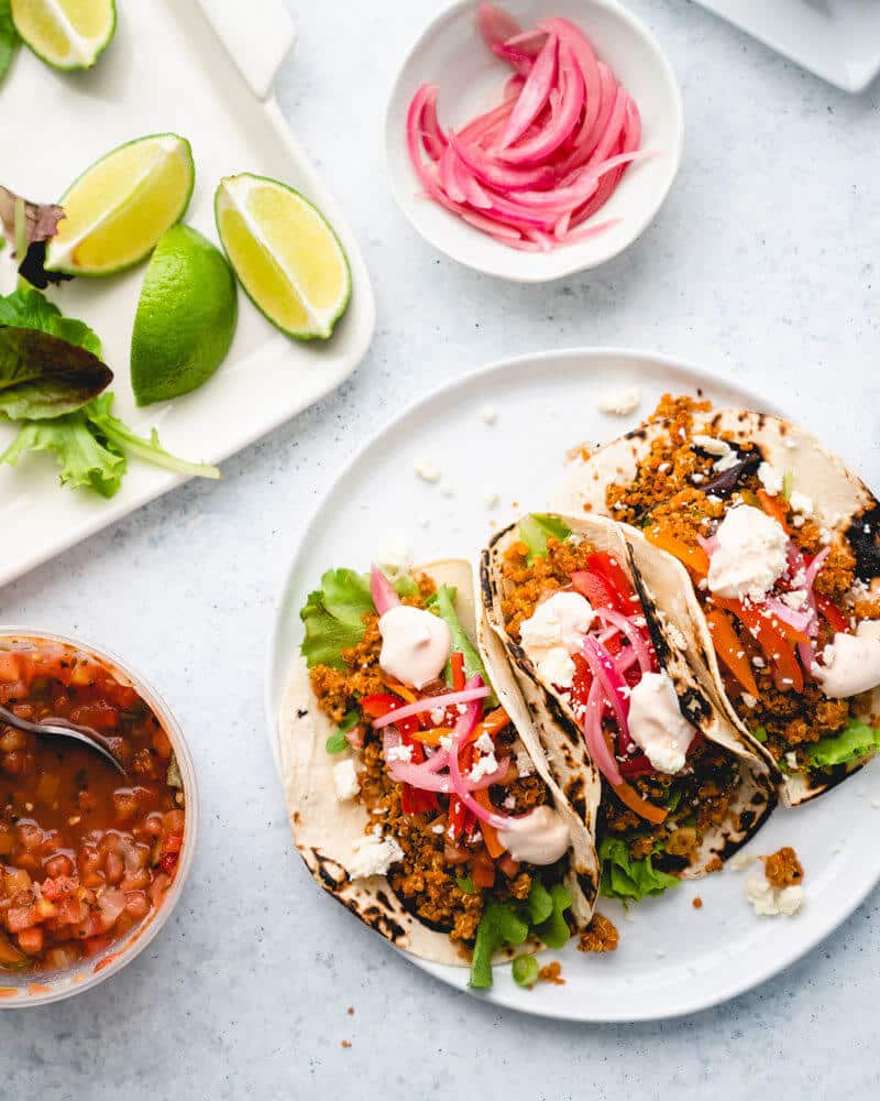 Tacos topped with salsa
