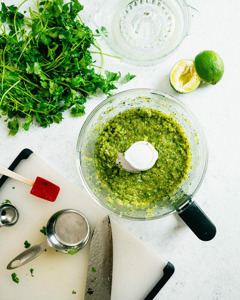 Food processor with green tomato salsa