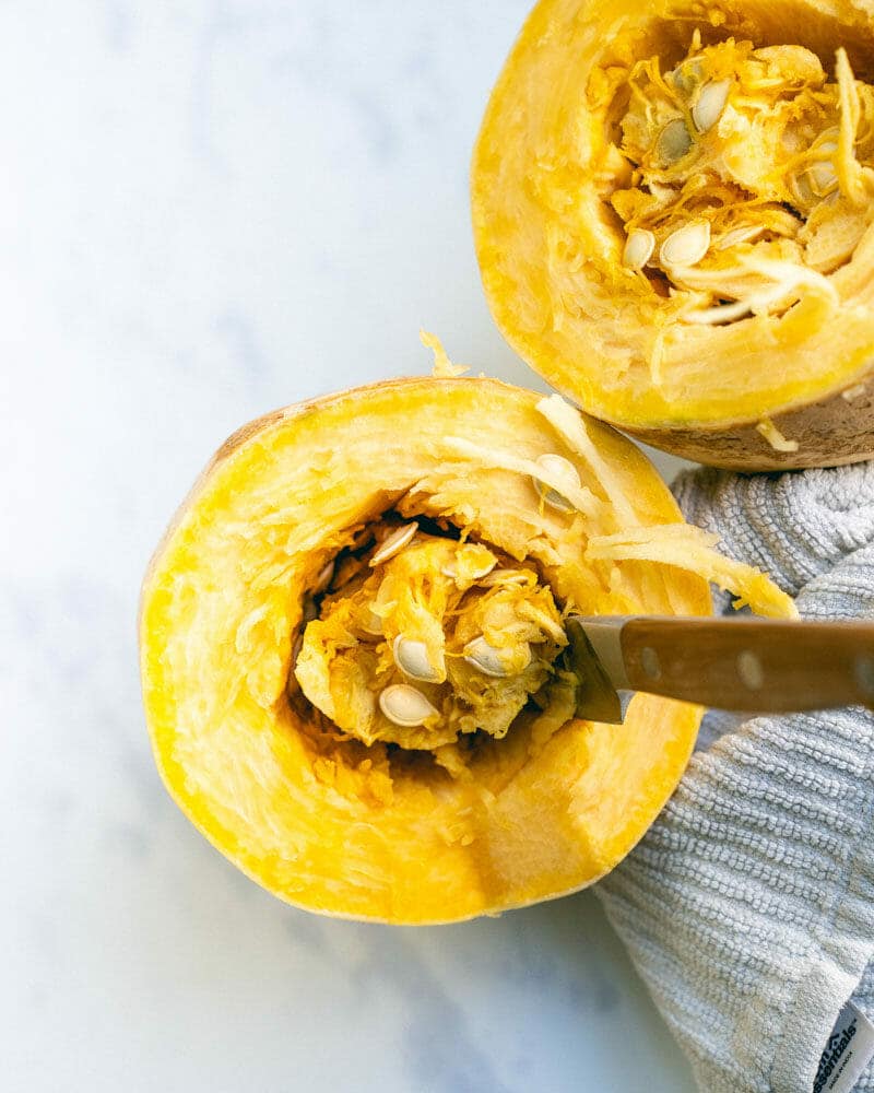 Cut the spaghetti squash in half widthwise