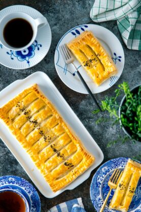 Japanese sweet potato pie served on plates along with coffee.