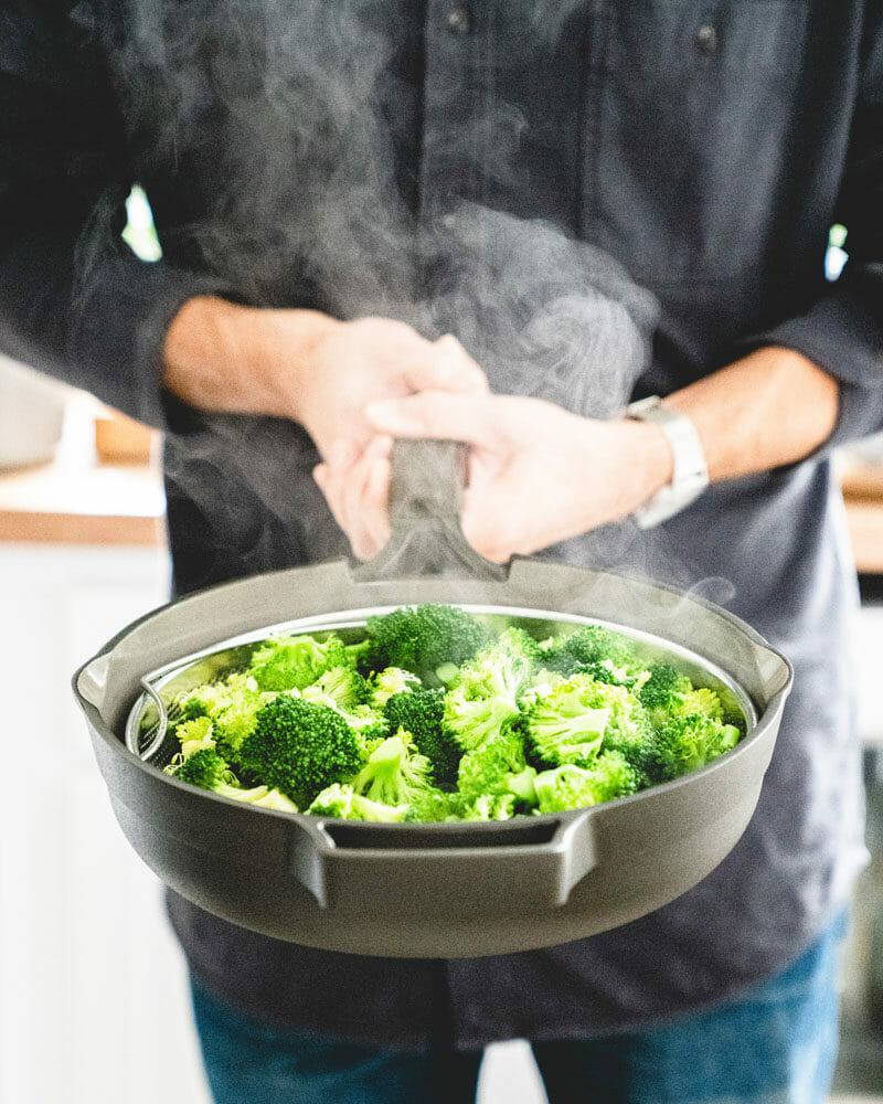 Step 3: Taste testing steamed vegetables. 
