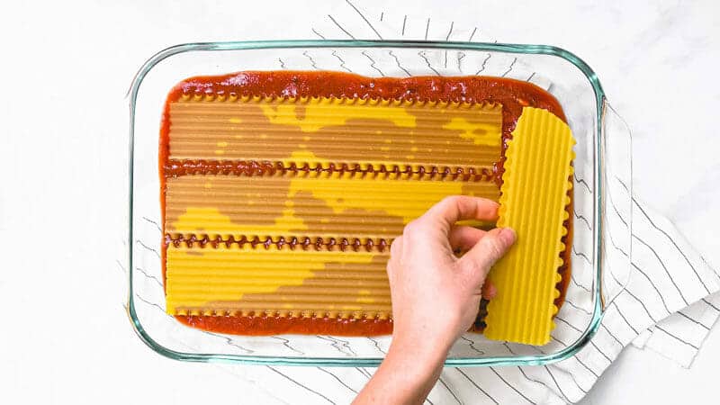 Layering the lasagna noodles