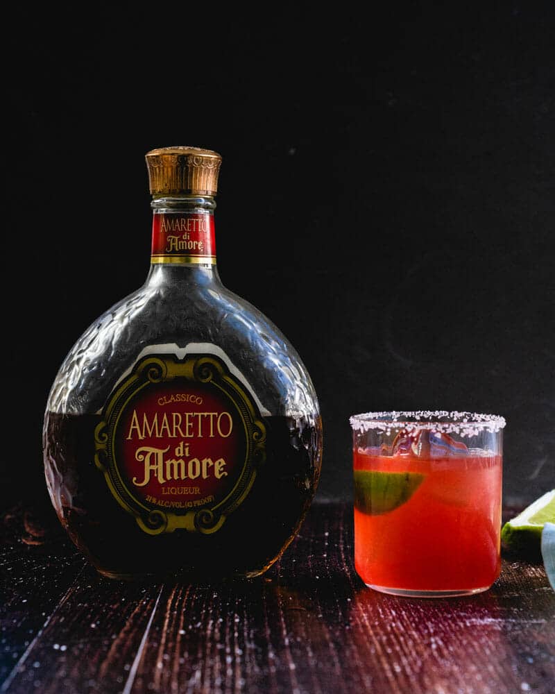 Amaretto bottle with Italian margarita.