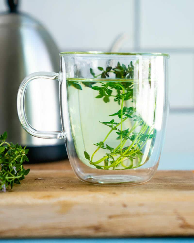 Thyme tea in a clear glass