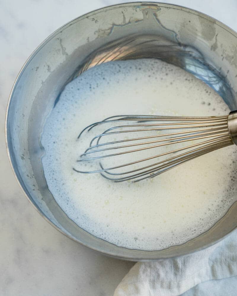 How to froth milk with a whisk
