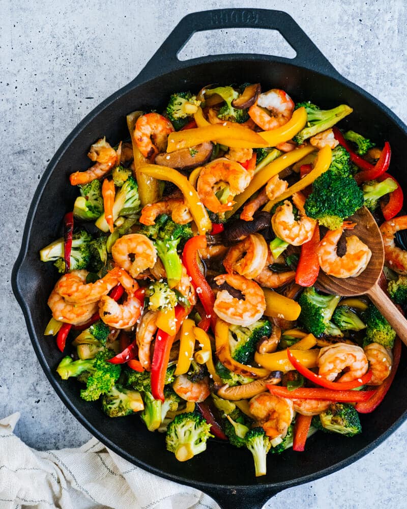 Shrimp Stir Fry with broccoli and peppers in a frying pan