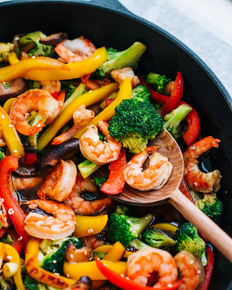 Shrimp Stir Fry with broccoli and peppers in a frying pan