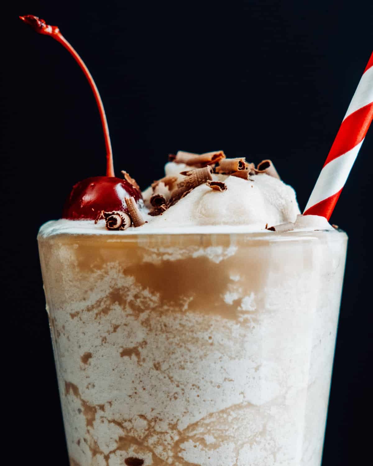 Bushwacker Drink in glass with cherry and chocolate shavings