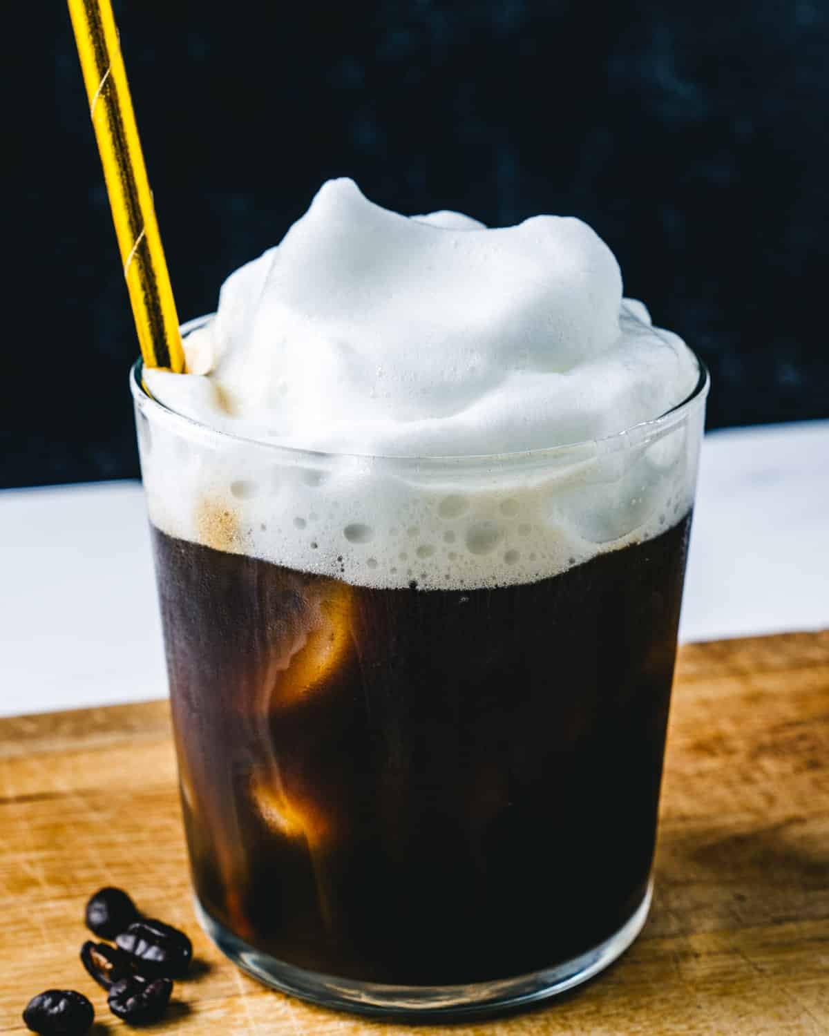 Cold foam in glass with straw