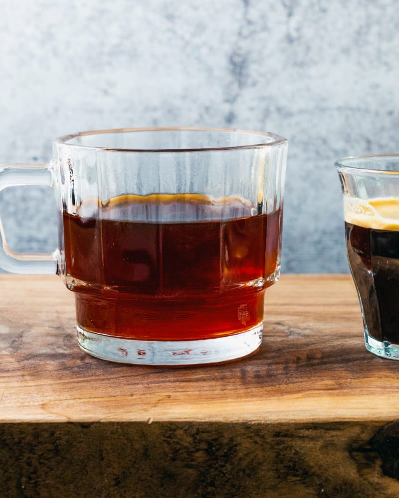 Red Eye Coffee in a short glass with a handle