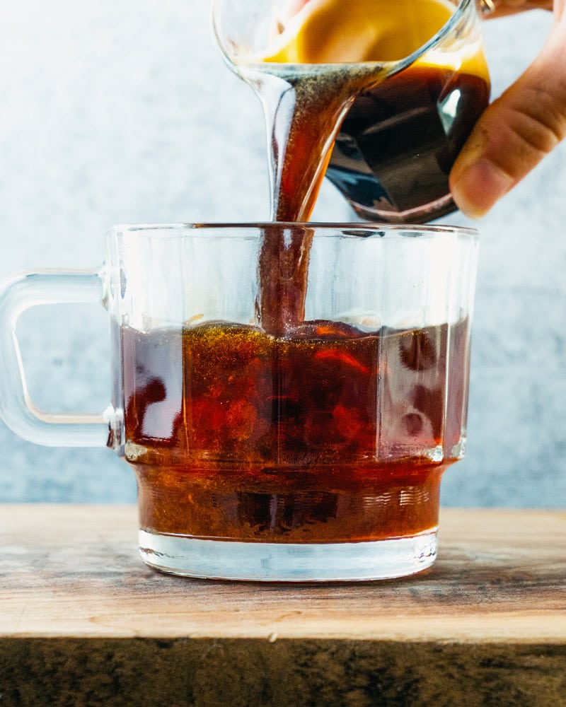 Red Eye Coffee with espresso being poured in