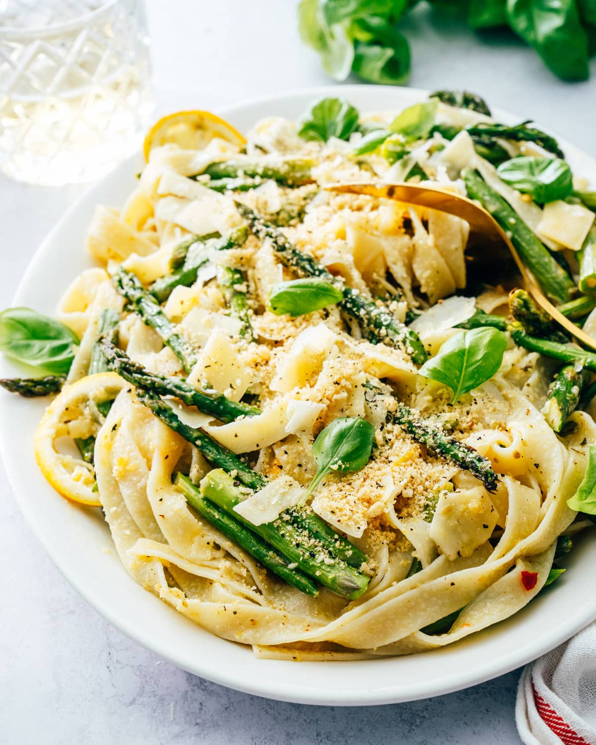 Asparagus Pasta on dish with breadcrumbs and basil. 