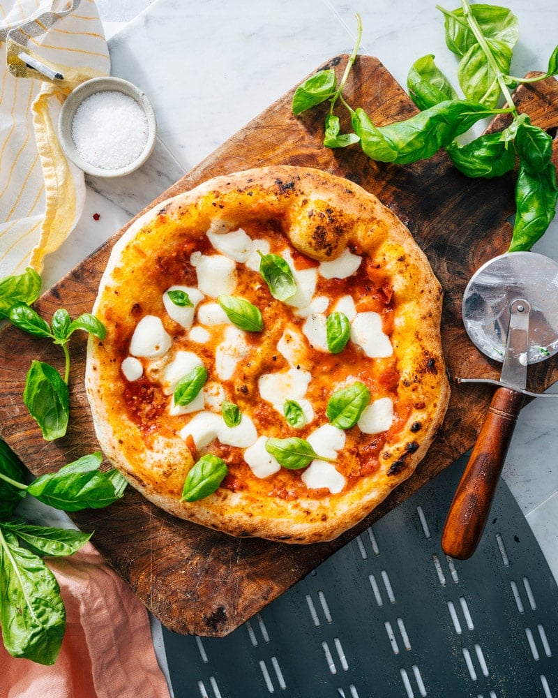 Margherita pizza recipe with basil and mozzarella cheese.