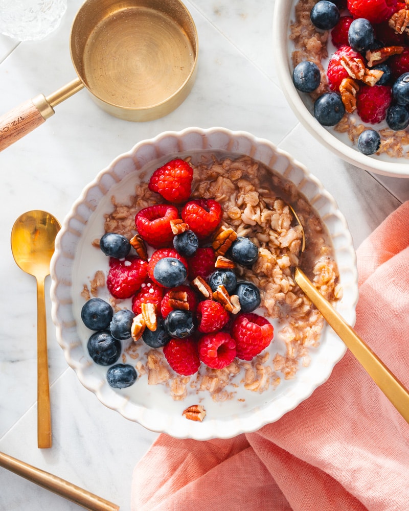 Bowl of microwave oatmeal with berries and pecans
