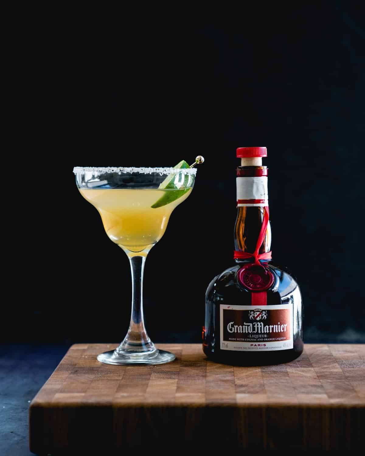 Cadillac Margarita with Grand Marnier bottle.