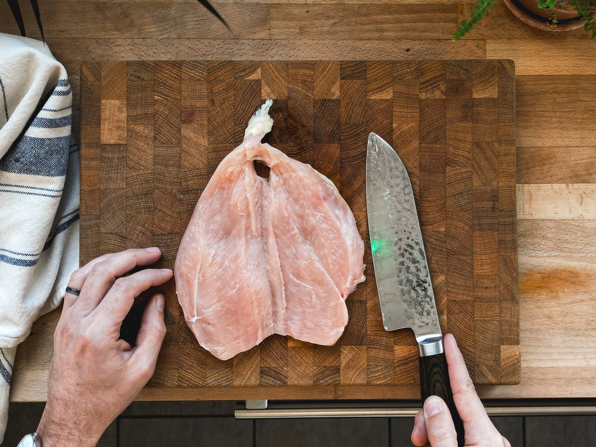 Step 2 Unfold the breast and separate.