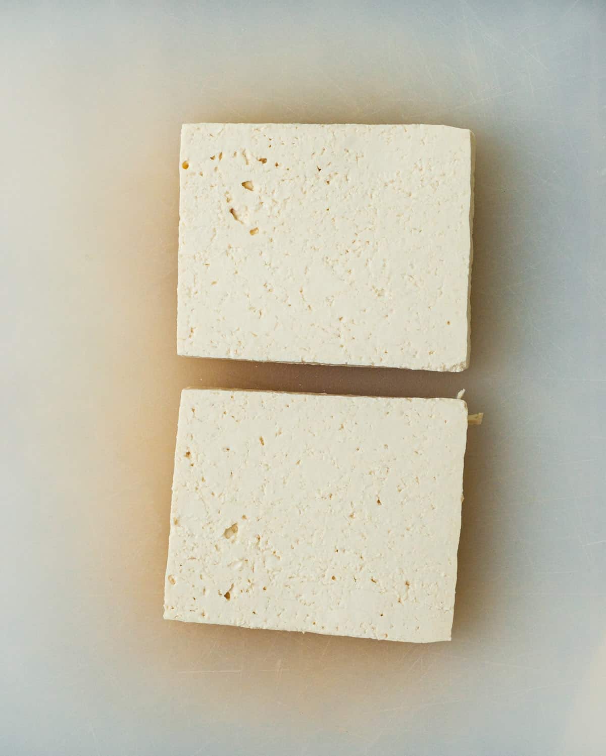 Step 1: Slice the tofu and press it.