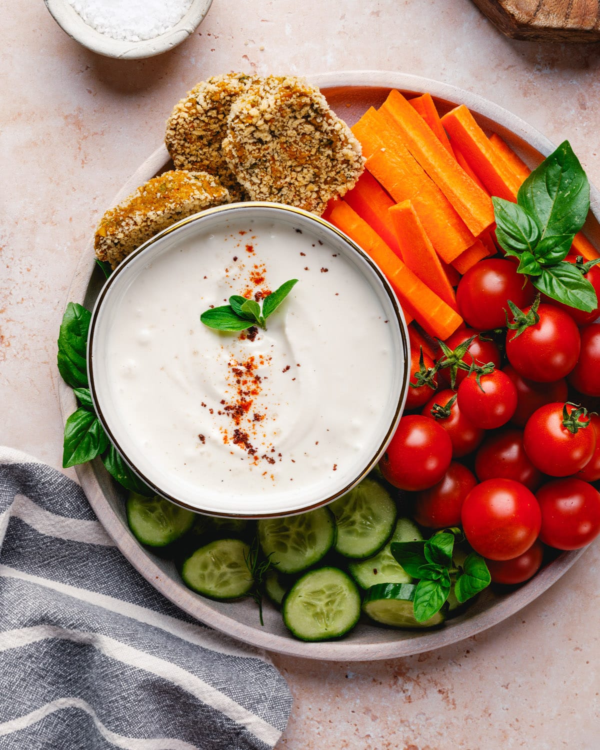 Tahini Yogurt Sauce in bowl with vegetables.