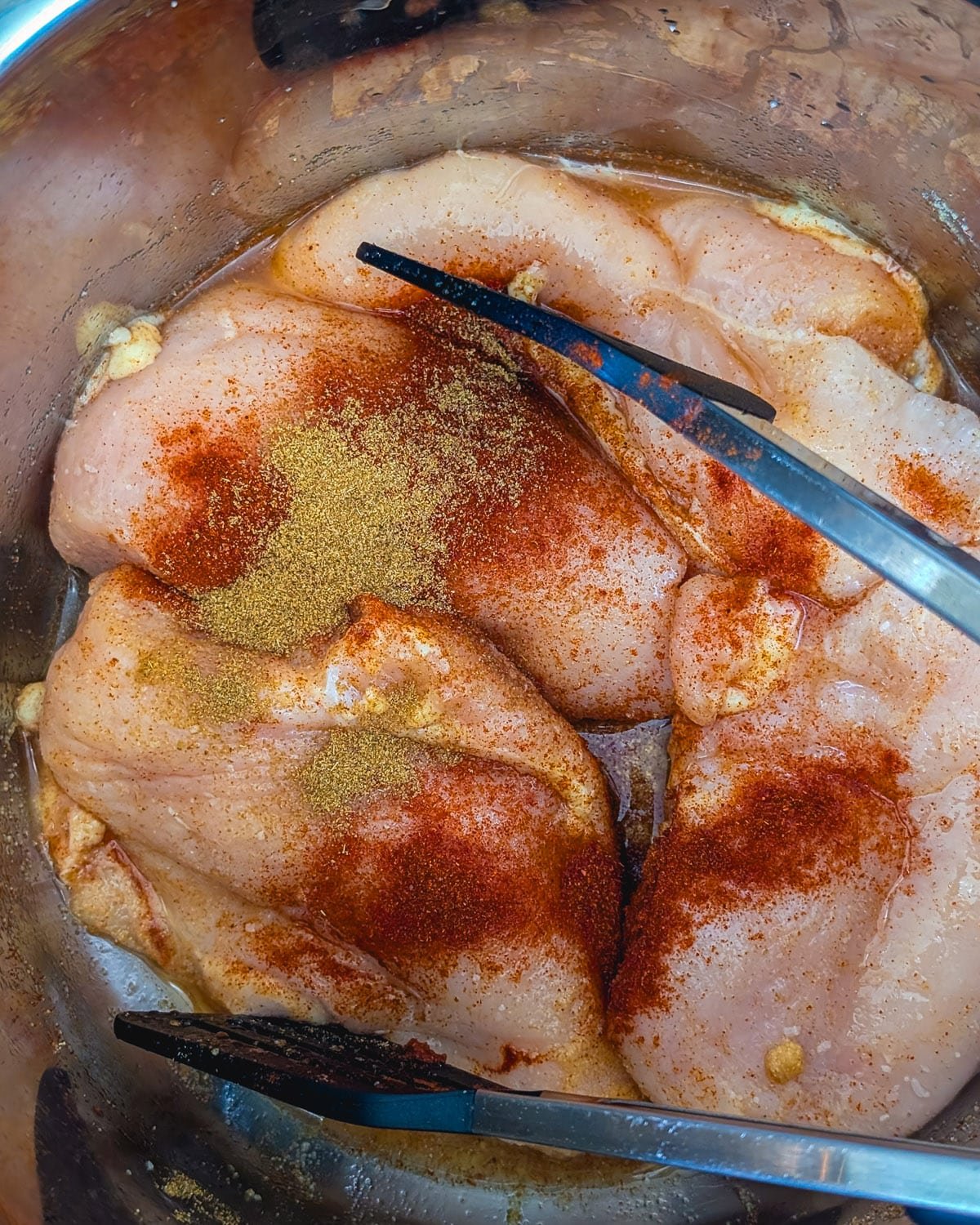 Step 1 Place the chicken in the Instant Pot with the spices