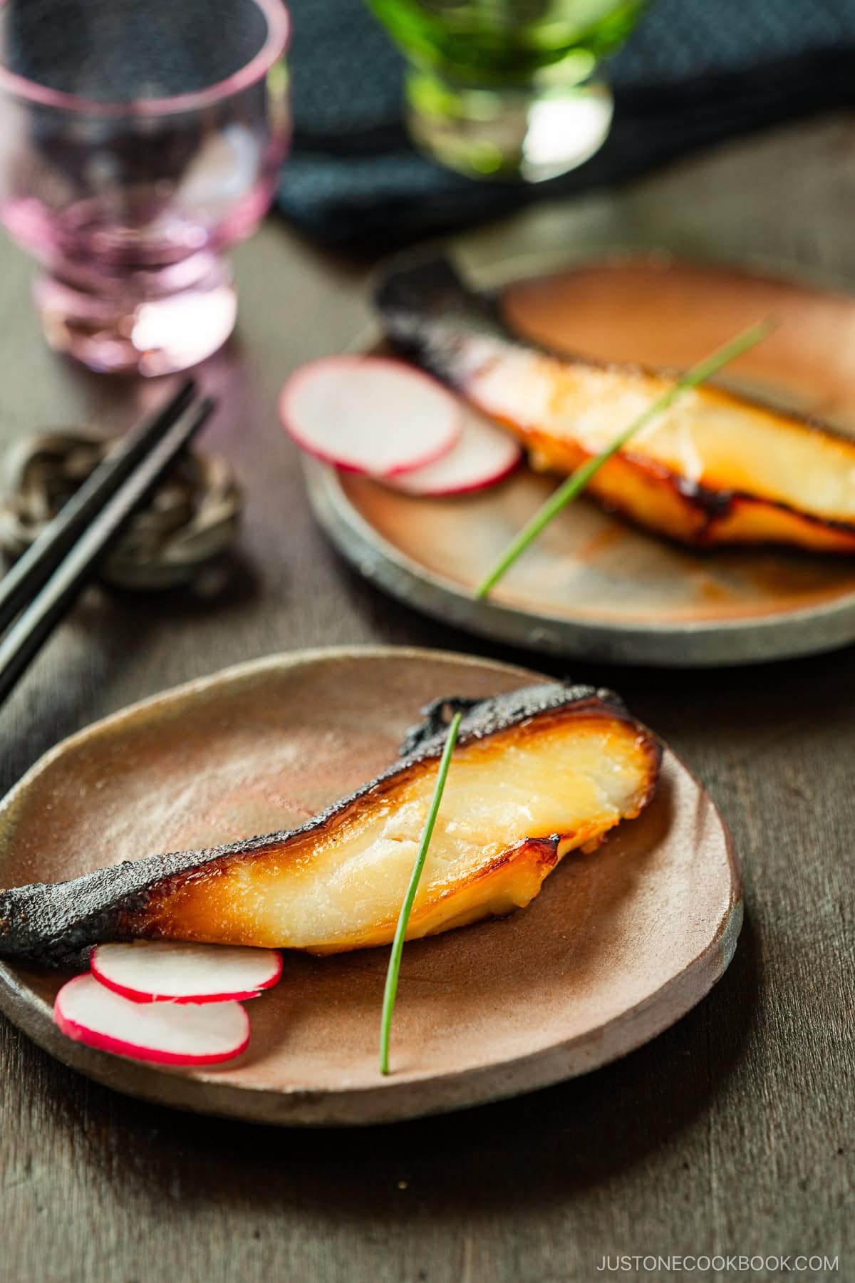 Round plates containing Miso Cod.