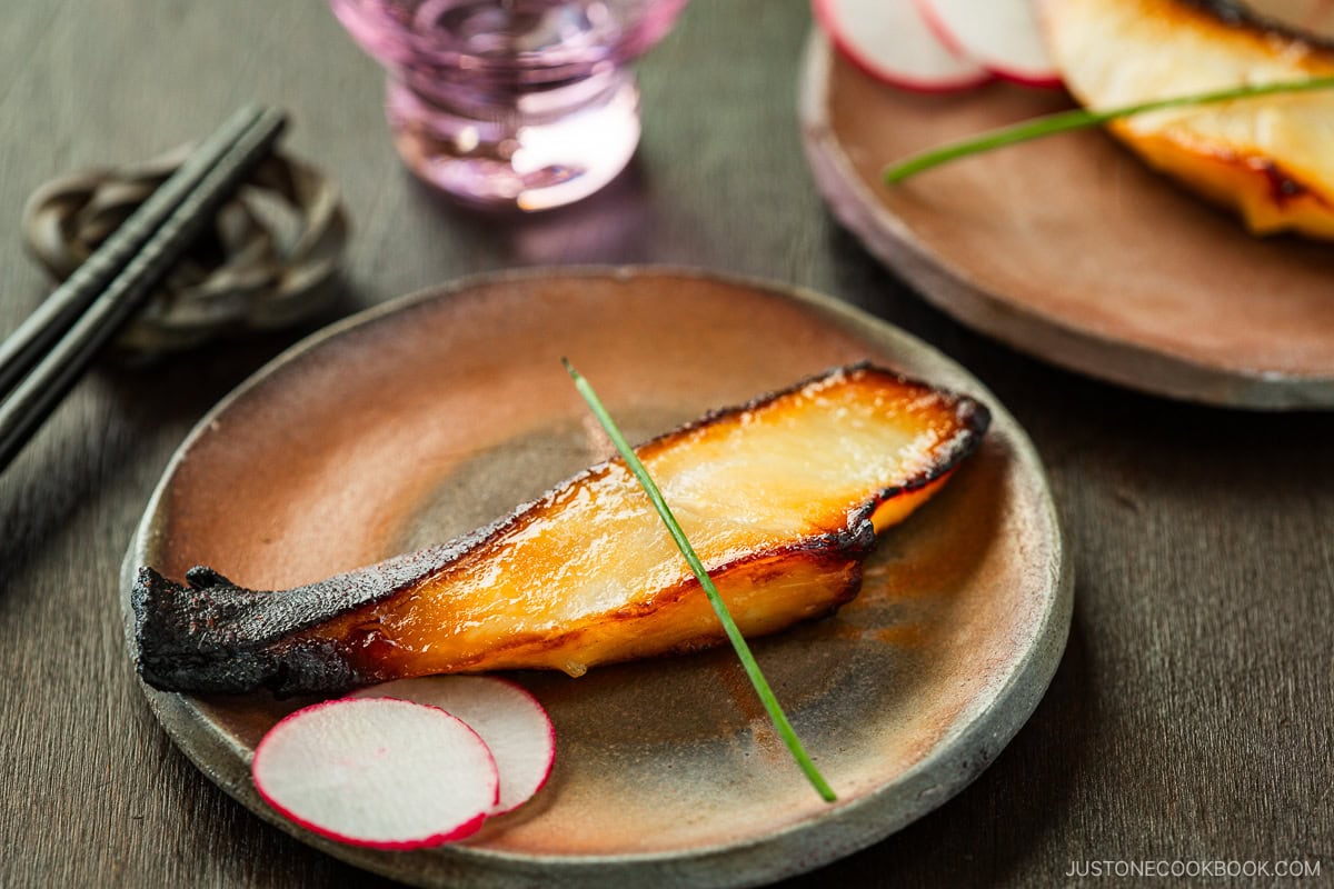 Round plates containing Miso Cod.