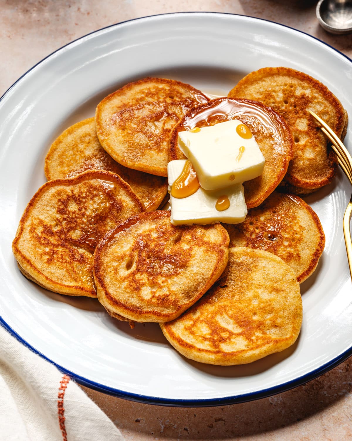 Silver Dollar Pancakes with butter and fork