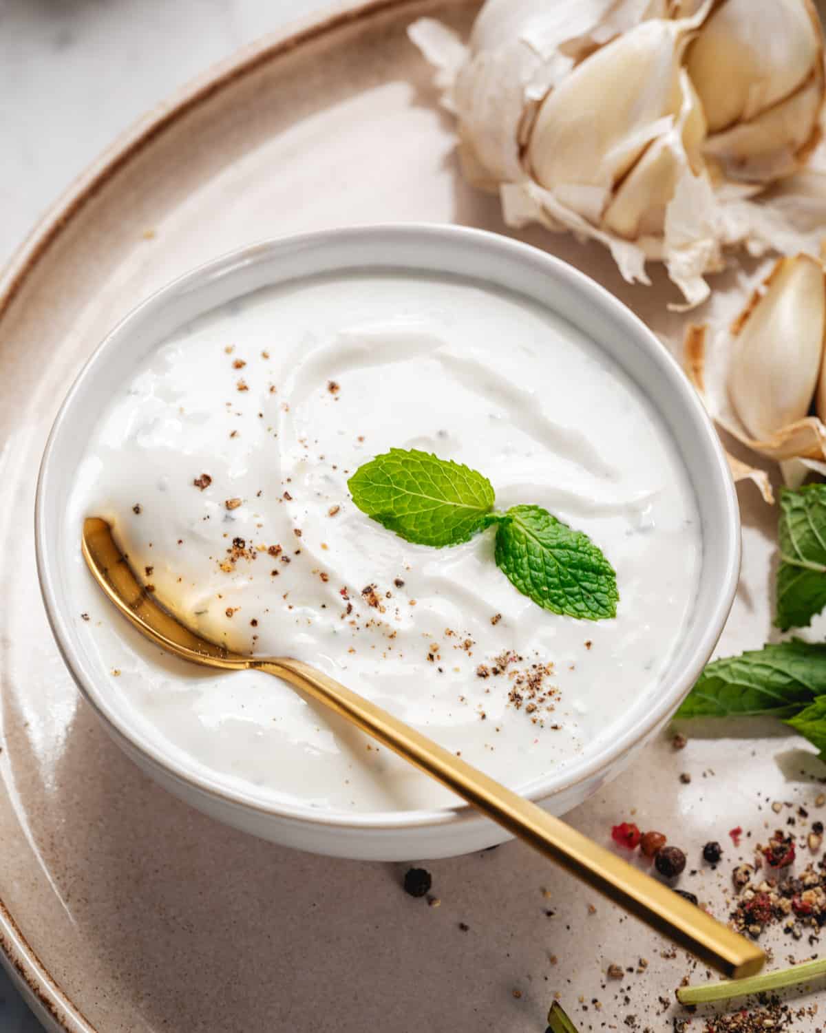 Greek Yogurt Sauce in a bowl with spoon