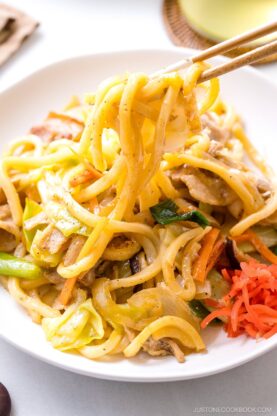 In my delicious Yaki Udon, we pan-grill thick and chewy Japanese wheat noodles with crisp vegetables and protein in a savory sauce. This popular udon dish is incredibly satisfying and ready in just 25 minutes. It's easily vegetarian or vegan adaptable, too.