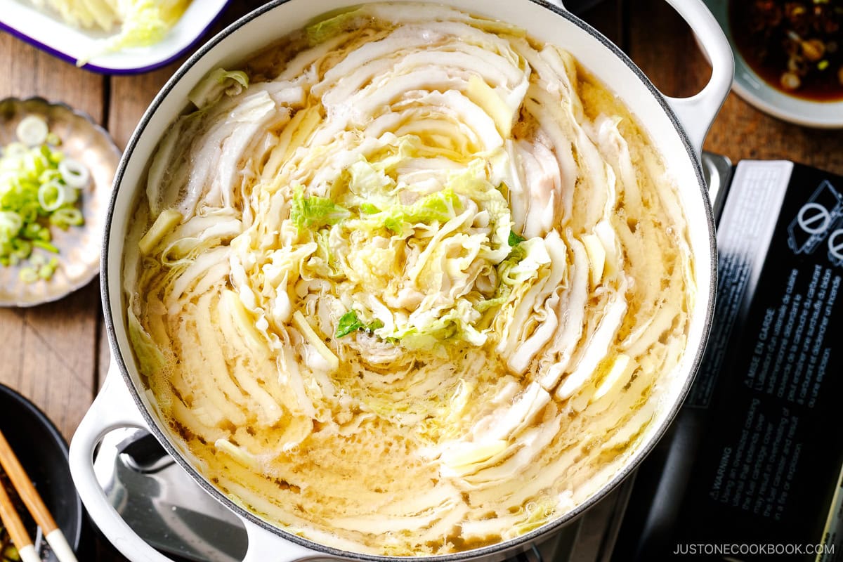 Cover the lid and bring to a boil. Then, reduce to medium-high heat and simmer until the cabbage is tender and the pork is fully cooked.&nbsp;