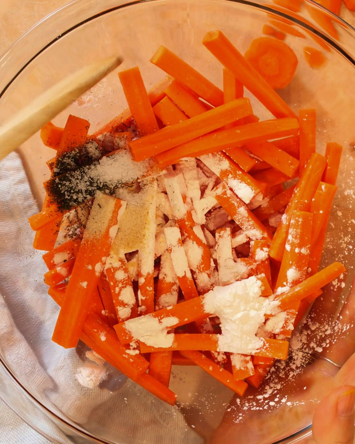 Toss the fries with olive oil and seasoning