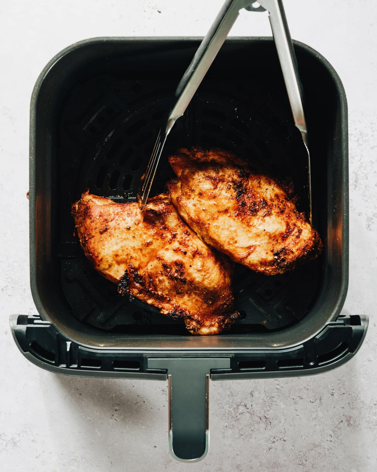 Step 2 Air fry the chicken for 15 to 20 minutes